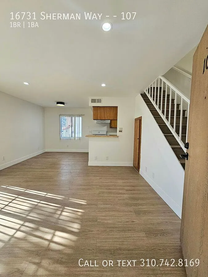Bright 1BR Townhouse-Style Unit w/ 2 Balconies — Photo 1