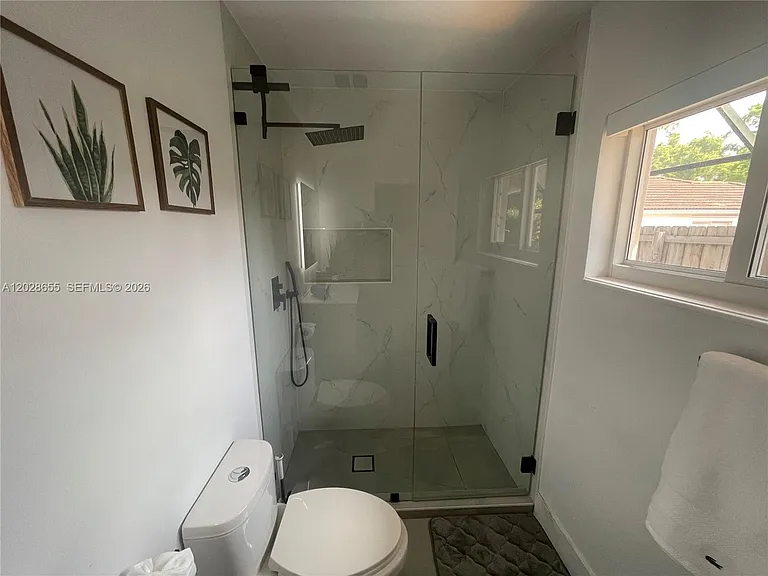 5733 NW 100th Ct — Photo 27