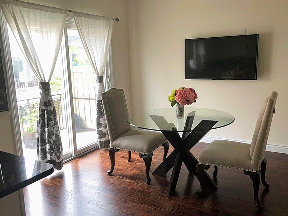 Eat-in kitchen dining room with sliding door to the balcony