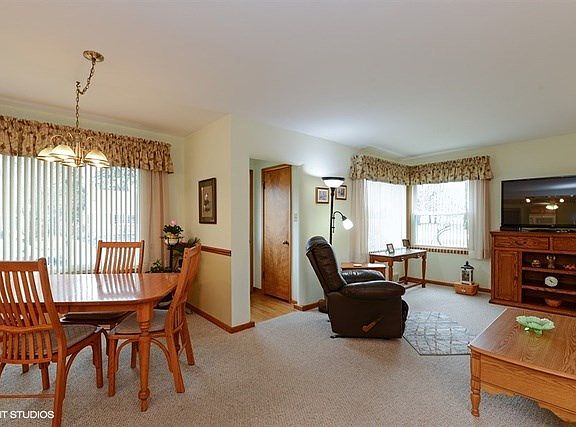 Hardwood entry with closet. Combined living/dining with wonderful windows for natural light!