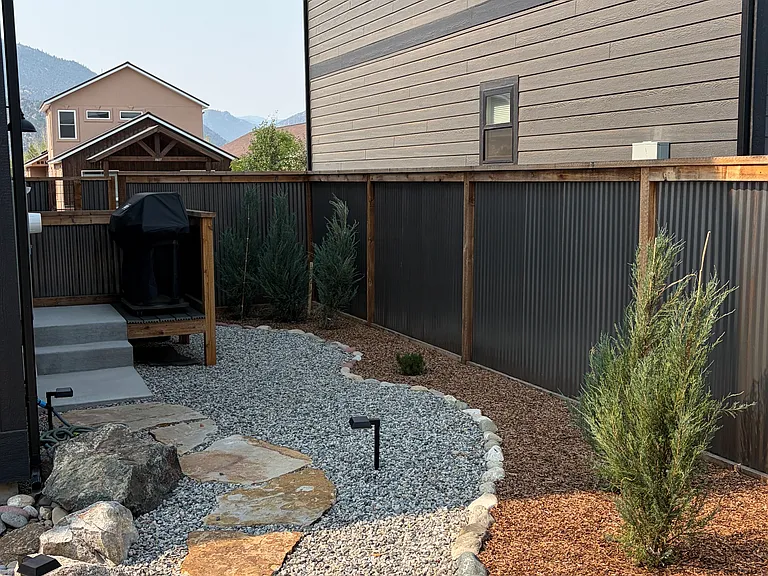 Backyard grill and landscaping