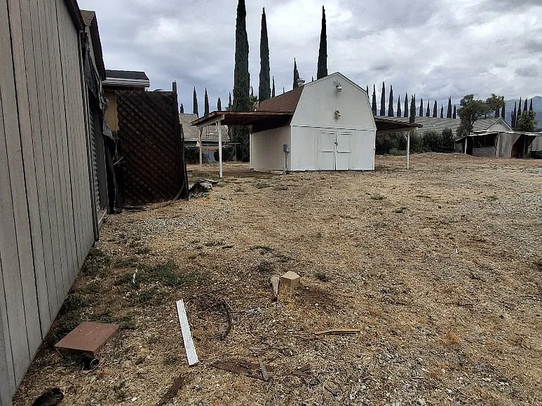 picture of lot showing two buildings