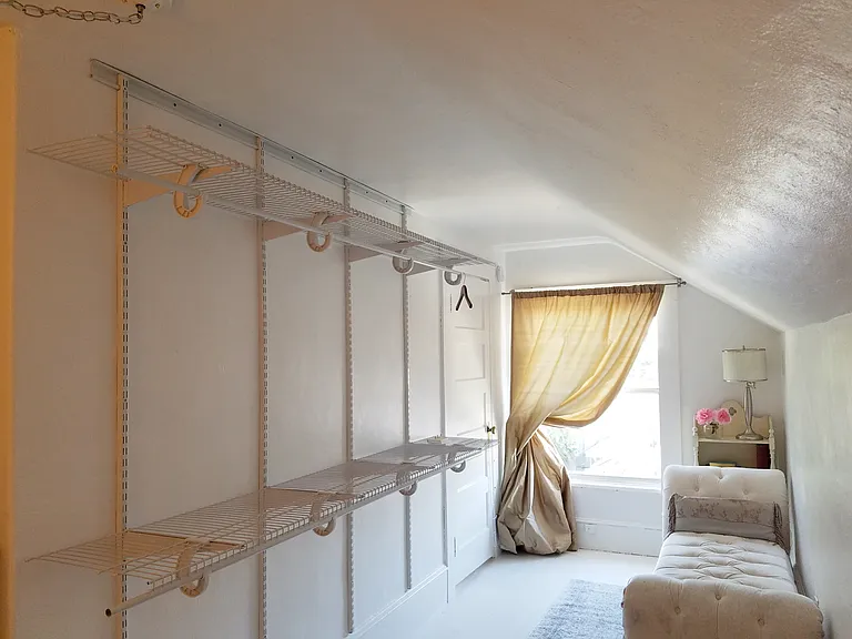 Flex room with closet -perfect as a nursery, home office, or large walk-in dressing room.