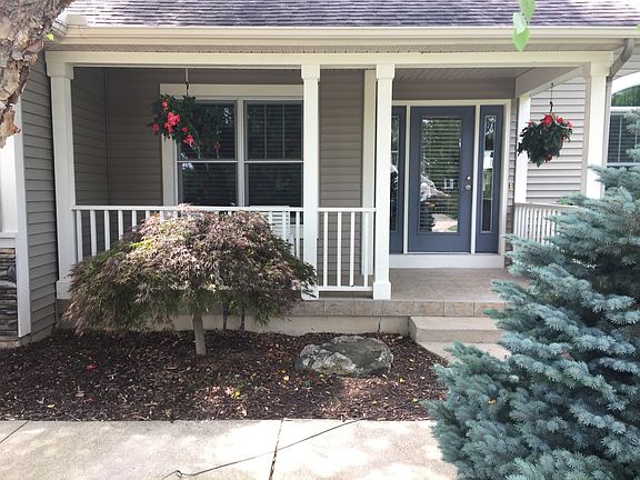 COVERED FRONT PORCH W TILE