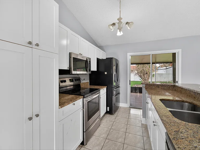 6956 NW Jorgensen Rd — Photo 8