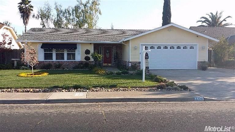 The Home faces the North. Tastefully Landscaped, easy care. RV access on the Westside of the Garage.
