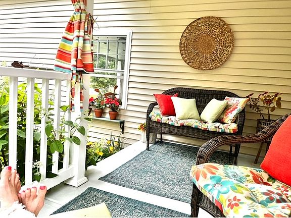 Comfy & private outdoor living space on the front porch