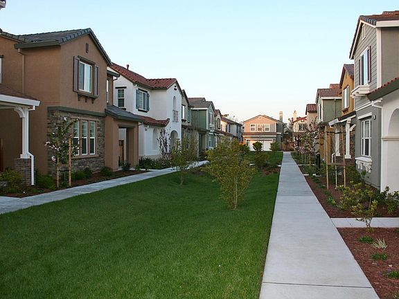 Front of the house opens to beautiful greenbelt