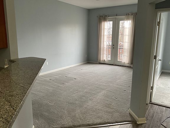 Living room with French balcony.