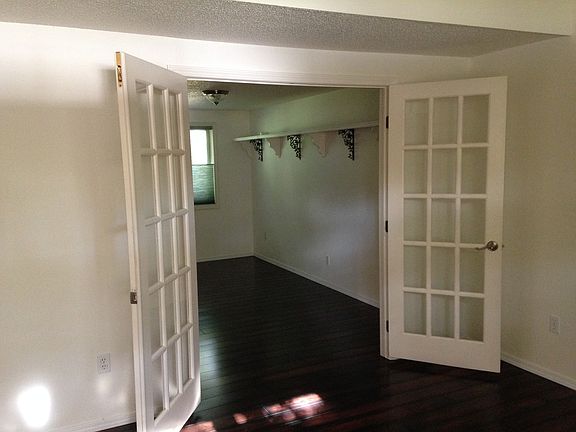 French doors to den open.