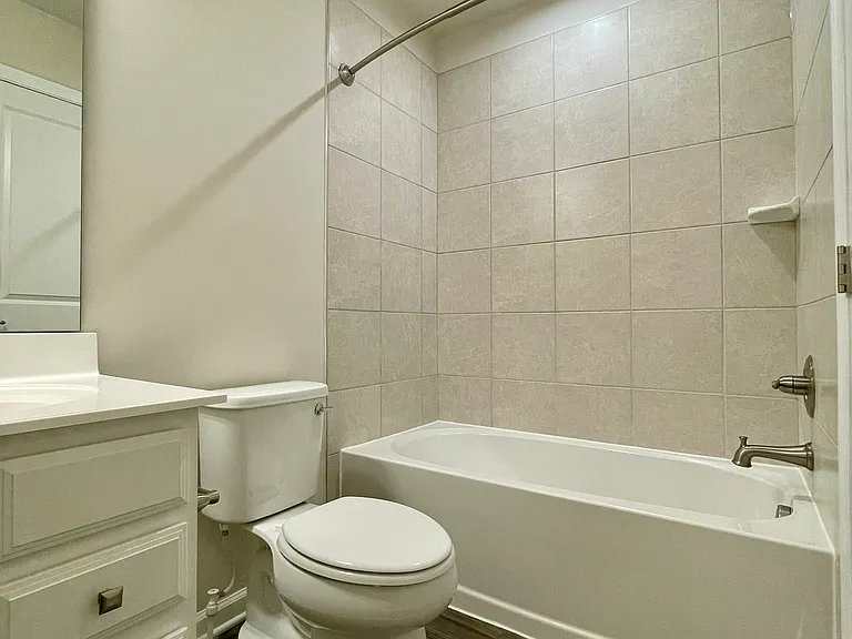 Full bath with tub and modern finishes