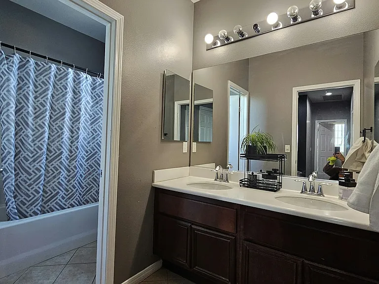 Upstairs Hallway restroom with shower