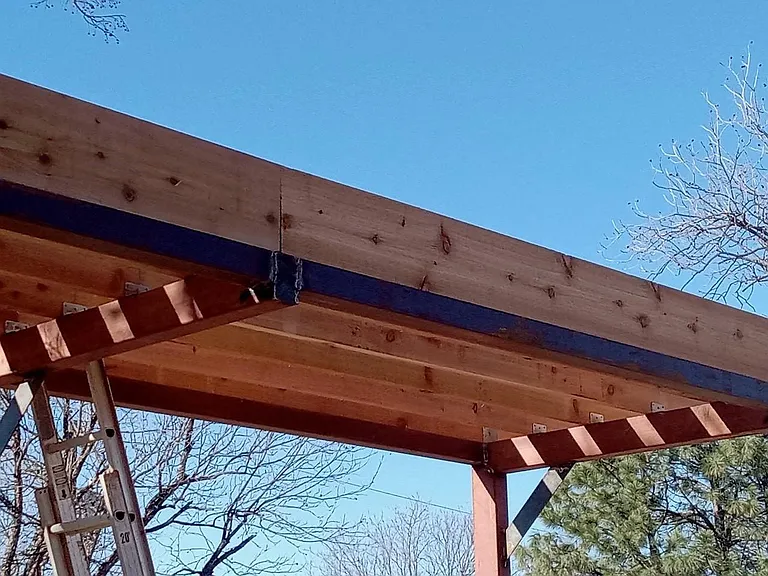 120' sq. ft. of covered seating area inside the 1600 sq. ft. sunning deck
