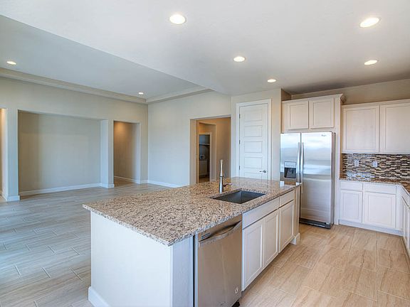 Open living room with entertainment center niche