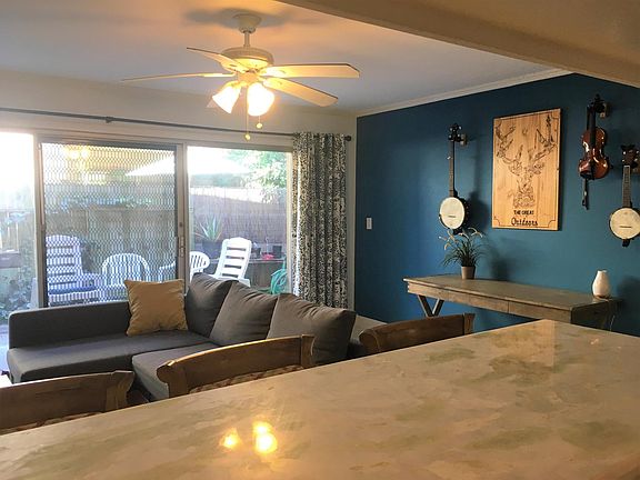 Bar/kitchen area opens to living room