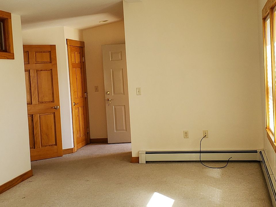 Bedroom door to left rear. Closet door beside it. Entrance door not visible to right rear