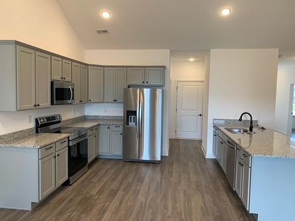 Generous size kitchen. Upgraded appliances, fixtures, and faucets.
