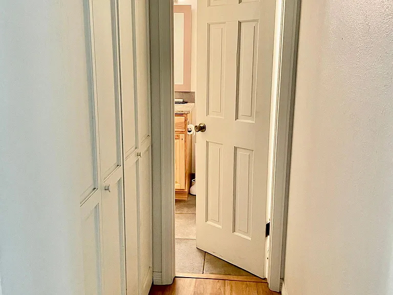 Main floor closet with 1/2 bath