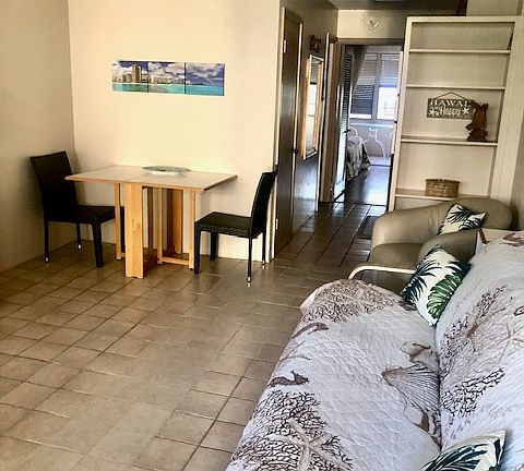 Living Room has a futon sofa-sleeper