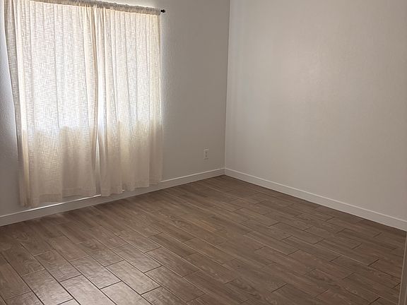 5th image of 3664 W Oakland St