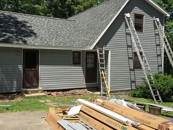 Roof/siding being installed 