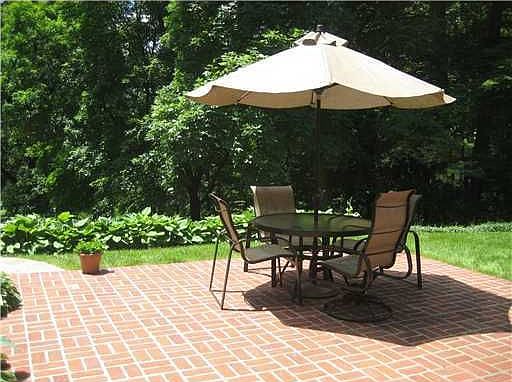 This large brick patio is located off the living/dining room area
