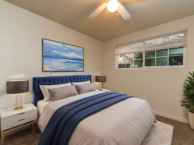 Experience tranquility in this elegantly designed bedroom, perfect for restful nights and peaceful mornings.
