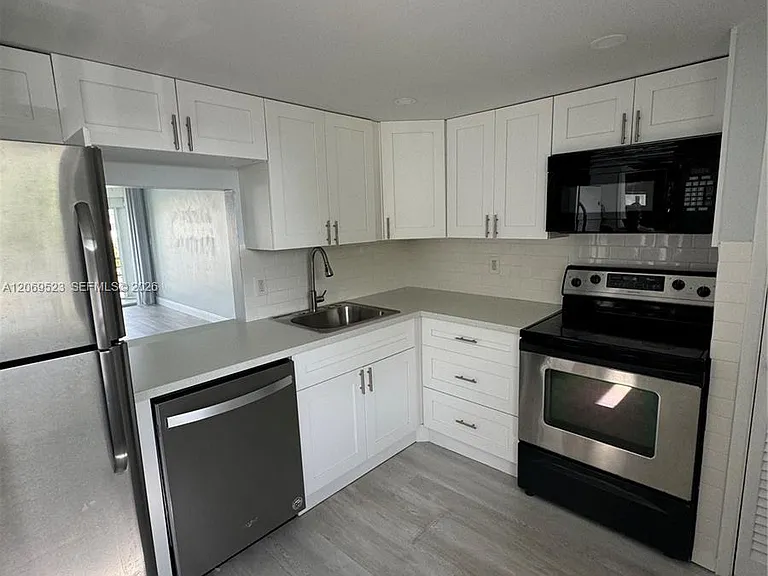 1398 NE 191st St #C305 — Photo 2