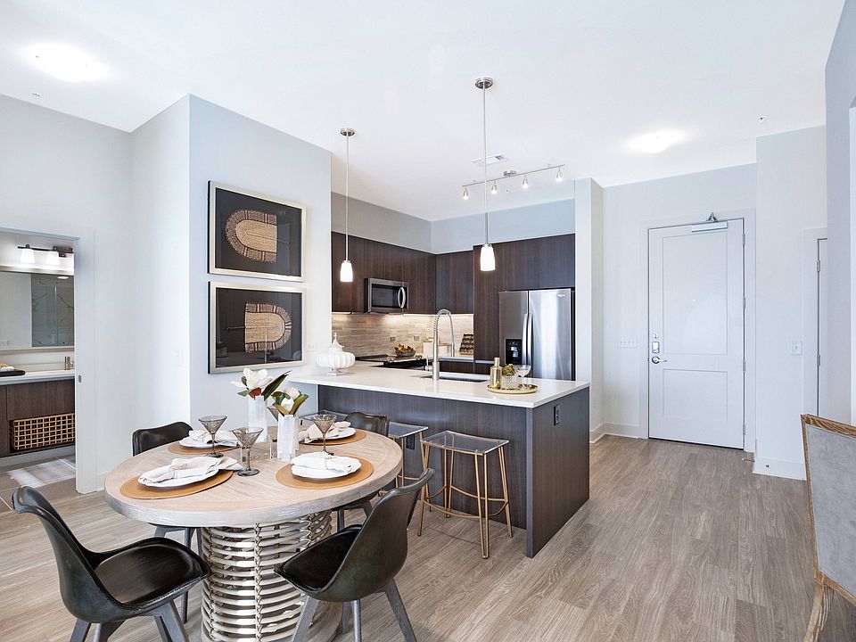 Wood-style flooring in living and dining areas
