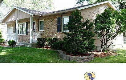 Front corner of house, wonderful landscaping and mature trees