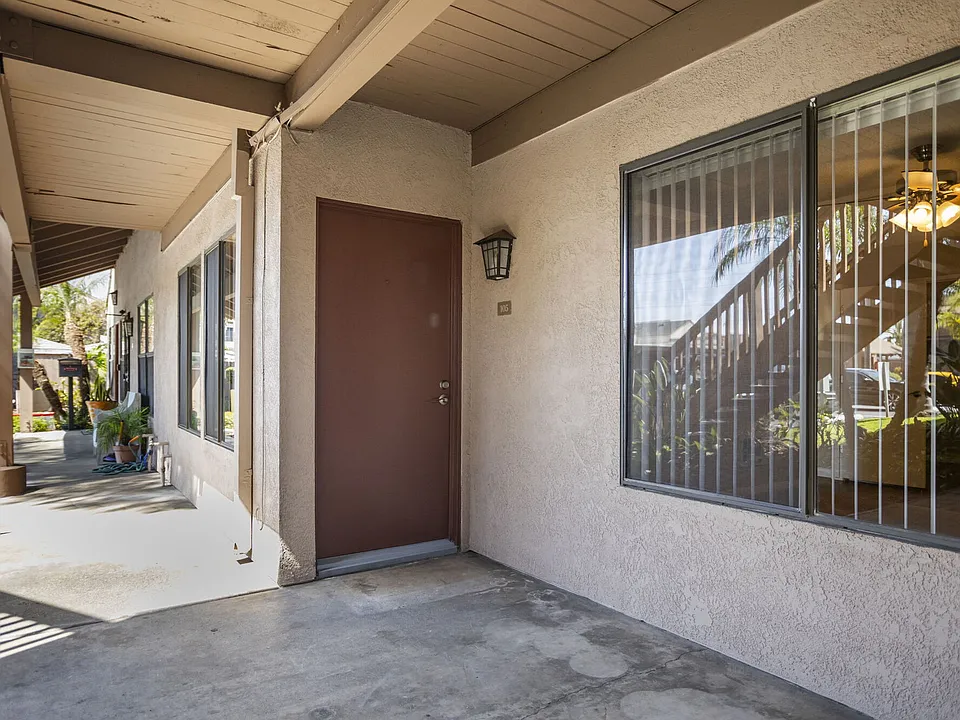 Apartment front door at Bay Breeze Apartments in Costa Mesa, CA