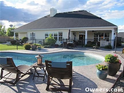 View of heated, self-cleaning gunite pool