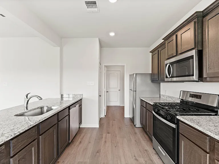 The kitchen has energy-efficient appliances.