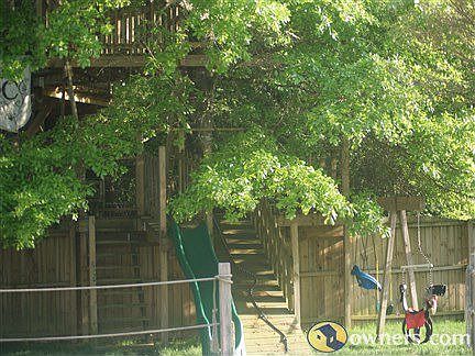 bottom level of tree house with small view of play area