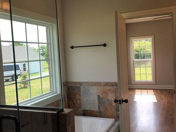 More master bath, looking into the bedroom. The seperate shower is next to the tub.