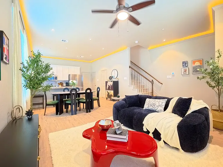 Open Concept Living, Dining, and Kitchen with Crown Molding (Plan 3201)