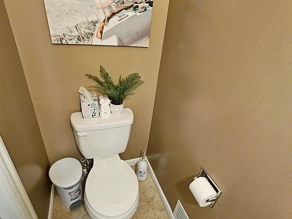 1/2 bath located upstairs.