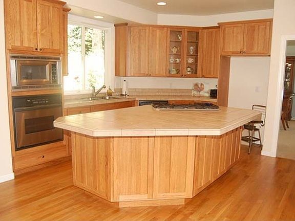 Island Kitchen w/Hi ceilings & Forest Views