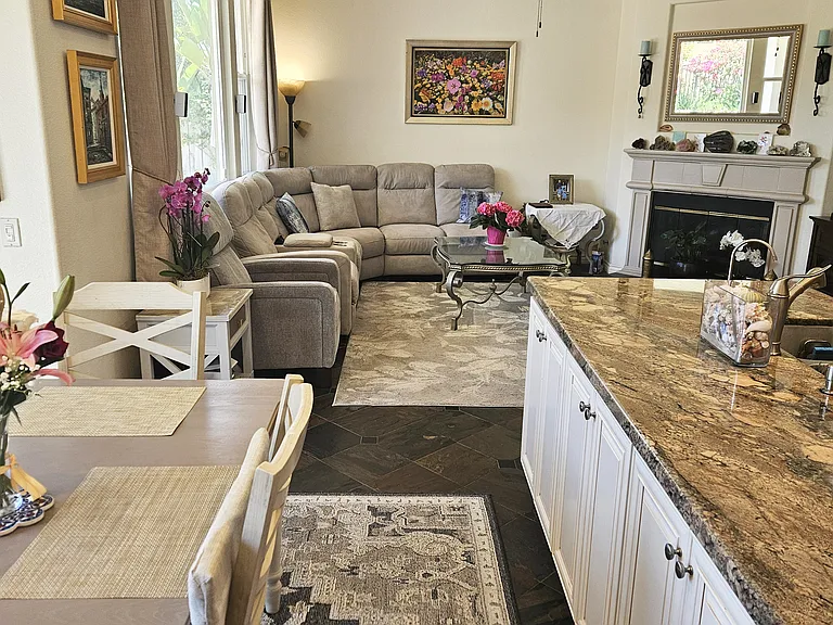 Another view of the family room from the breakfast table. Note our new granite counter's natural rock patterns.