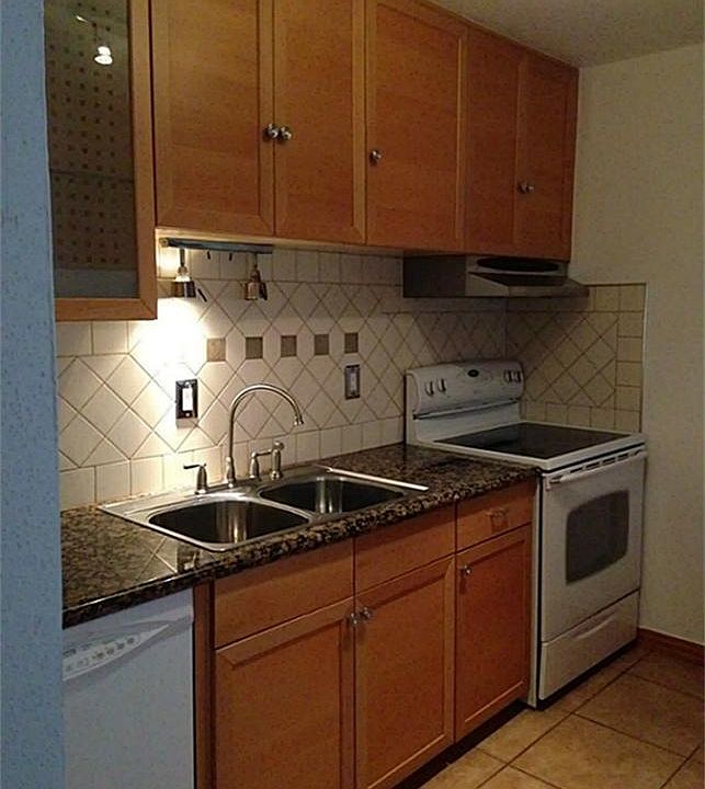 Kitchen with granite countertop