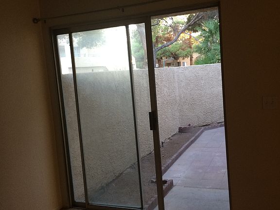 Downstairs bedroom sliding door to the yard