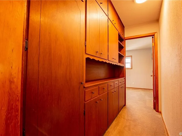 Hallway with built in cabinets