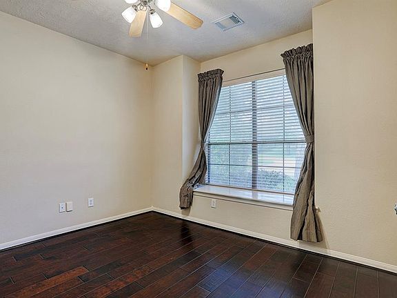 Through the double doors a flex room would be a great office, downstairs play room or work out room-endless options.