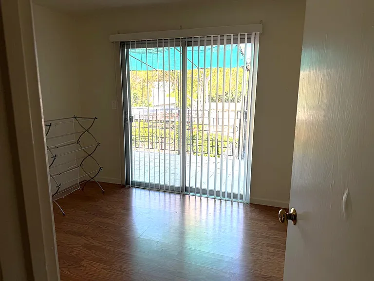 Room 1 - Hardwood floor + Balcony