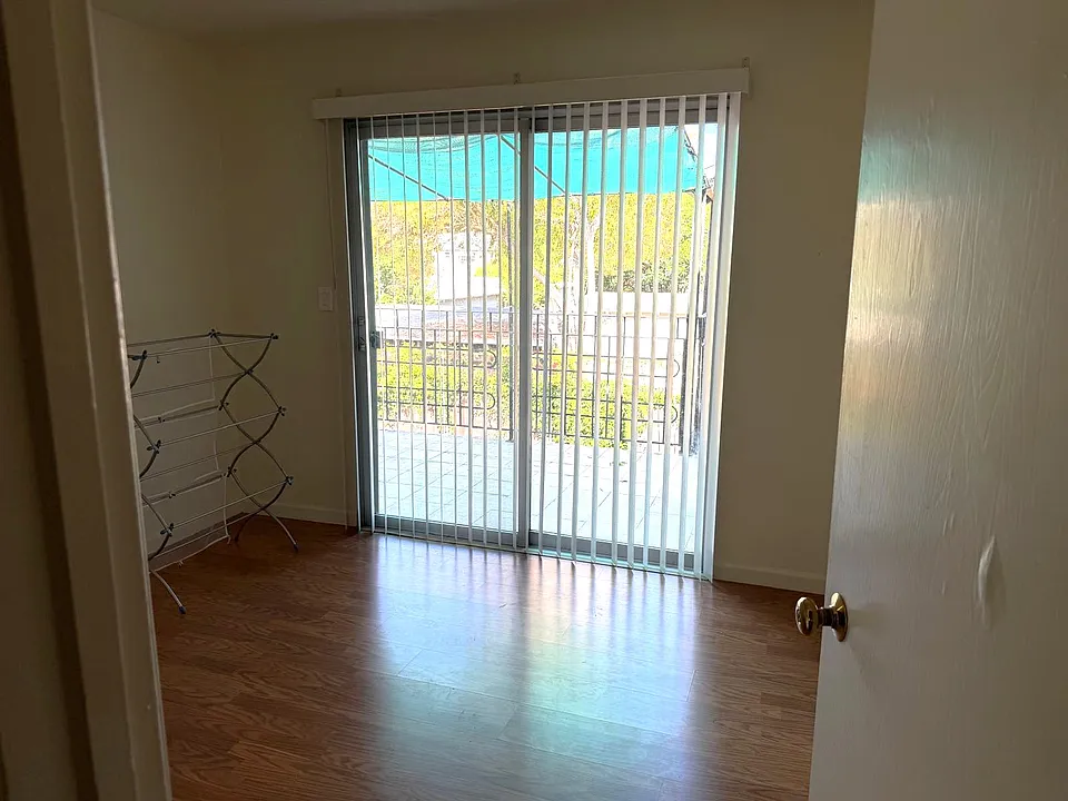 Room 1 - Hardwood floor + Balcony