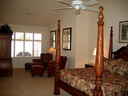 Large master bedroom with sitting area