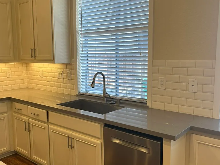 Kitchen, with lots of cabinet space, freshly painted interiors