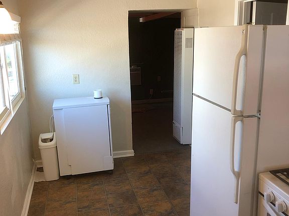 Kitchen with newer portable dishwasher