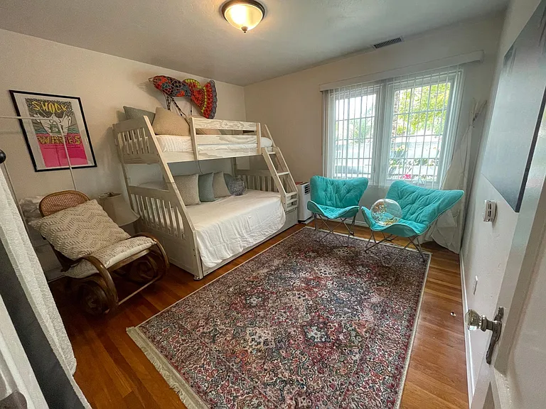 Bunk room with a twin upper, double lower, and twin trundle so SLEEP FOUR