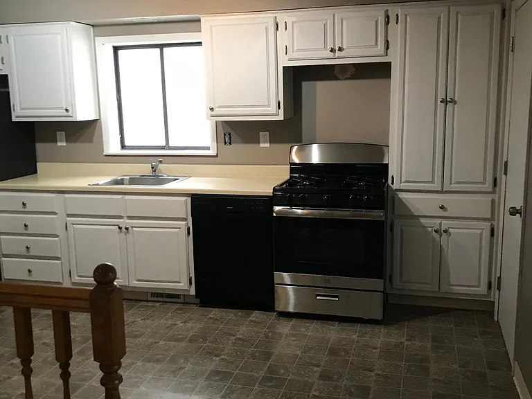 Kitchen. Brand new stainless steel range.
